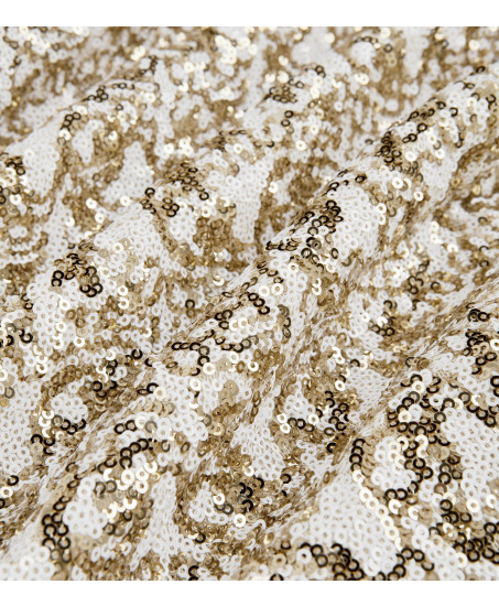 Vorderansicht Freisteller: Champagner-Gold Pailletten-Jumpsuit von Natascha Gruen mit elegantem Neckholder-Abschluss.